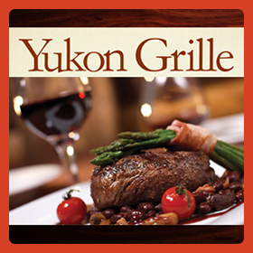 Yukon Grille logo over a steak dinner.